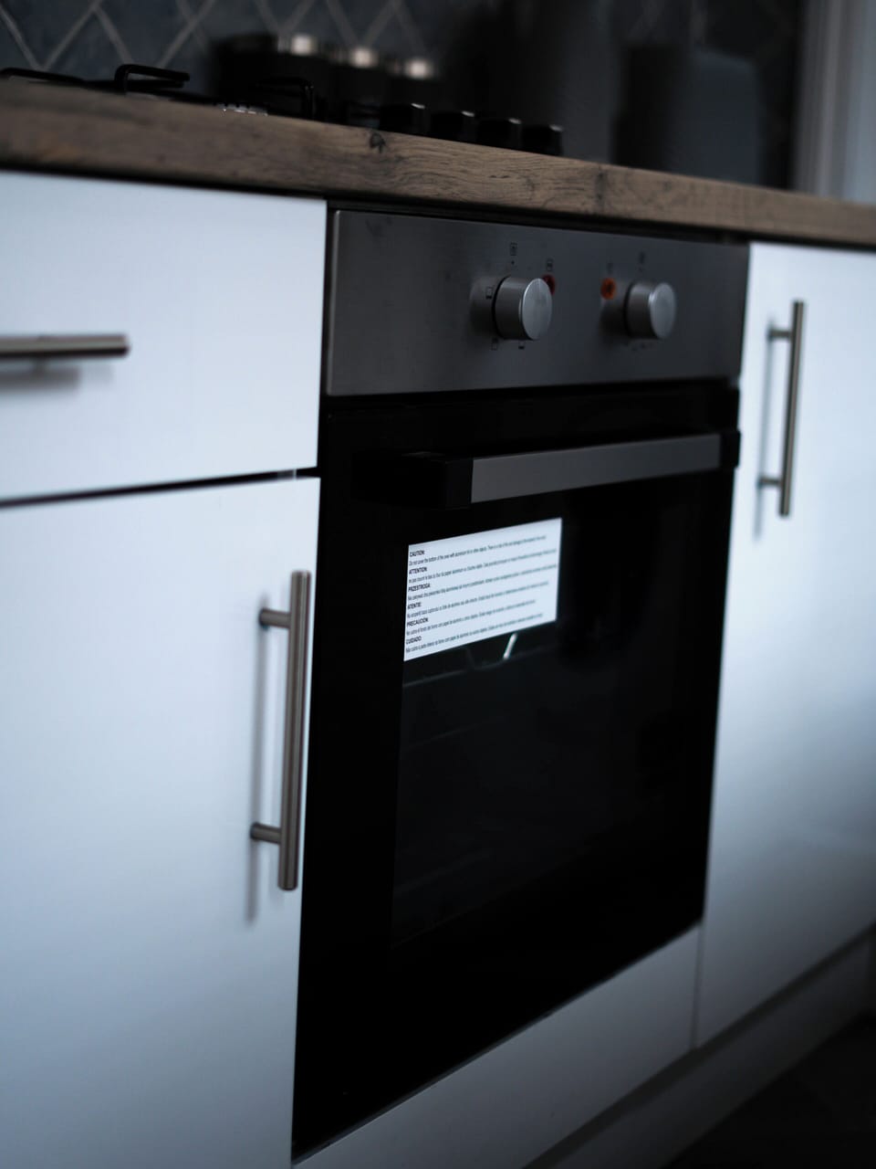 Modern kitchen with built-in oven and sleek contemporary finishes
