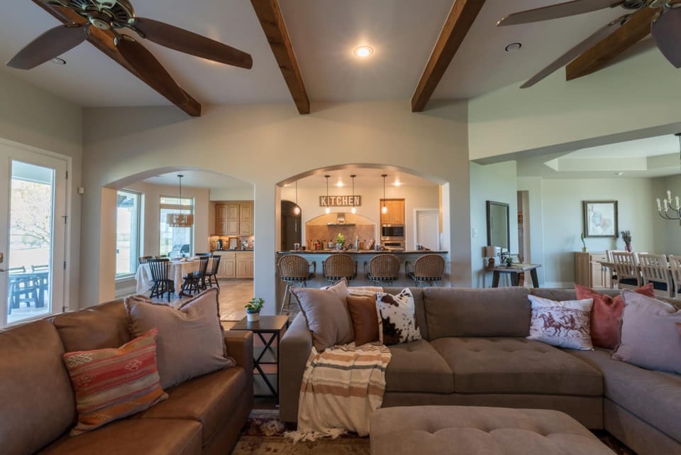 Signature House, 4 Bedrooms, Non Smoking, Air conditioning | Living room | 55-inch Smart TV with digital channels, fireplace, offices