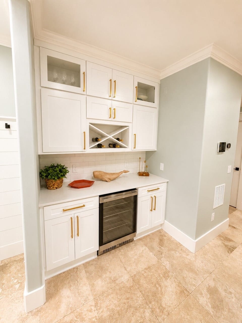 Extra counter space and a beverage nook make entertaining effortless.