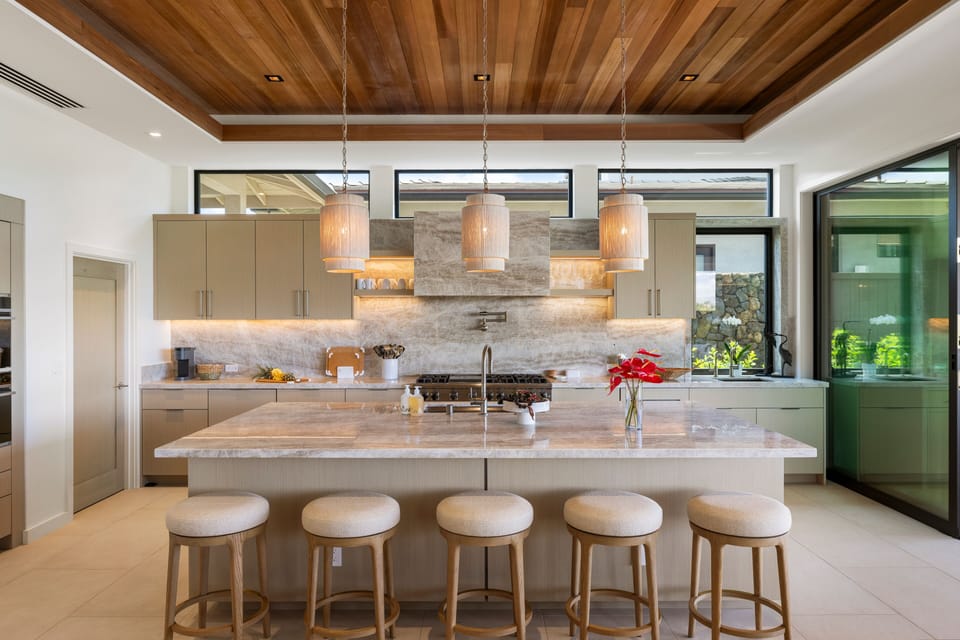 Settle in at the kitchen island for a relaxed spot to dine and gather.