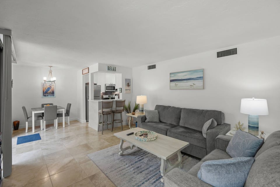 Whether you're dining or unwinding, this open space is the heart of the home.