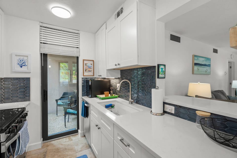 Sleek finishes and modern appliances make cooking a pleasure.
