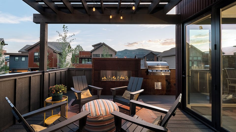 Deck, Main Level - Outdoor fireplace with seating area