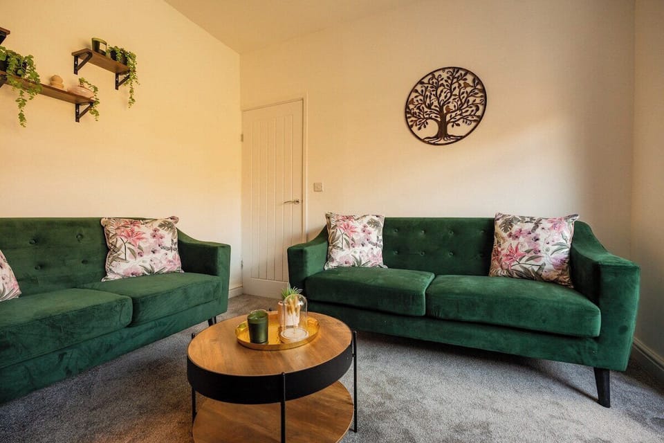 Make yourself at home in the inviting living area, with comfortable seating and a TV creating an easy setting for relaxed evenings. Settle in with a film, catch up over conversation or simply unwind between days out.