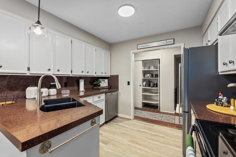 Bright hallway with two bedrooms and ample built-in storage