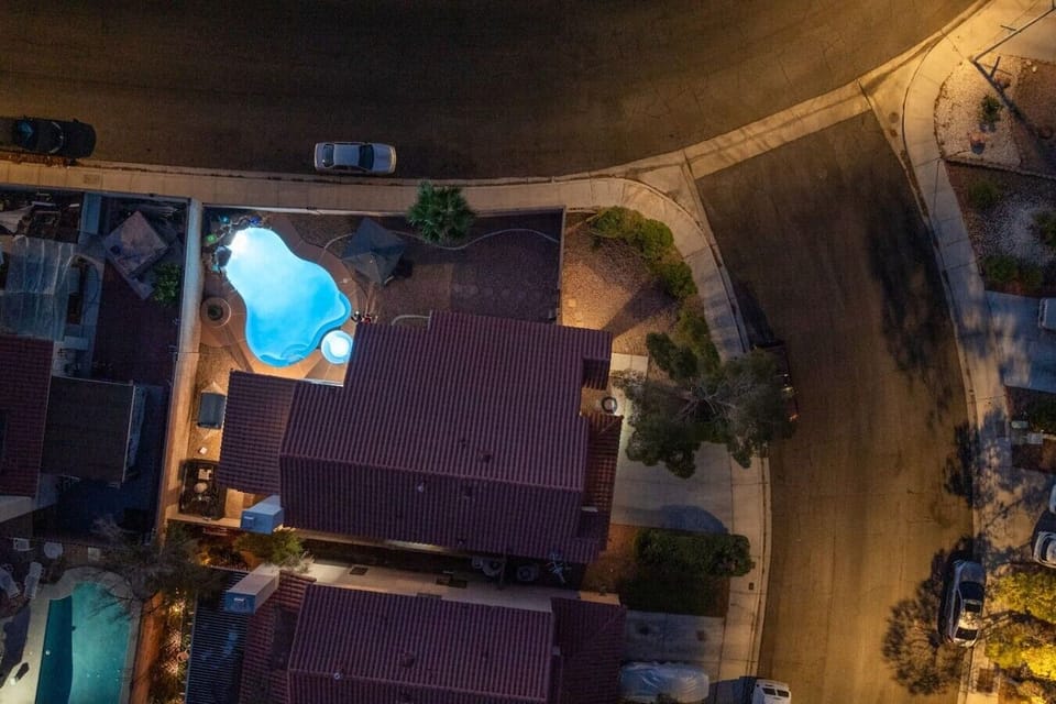 Aerial view of the home and private pool