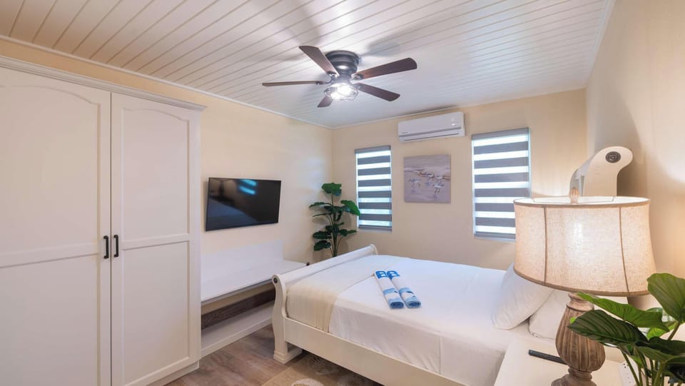 Cozy queen bedroom with Smart TV