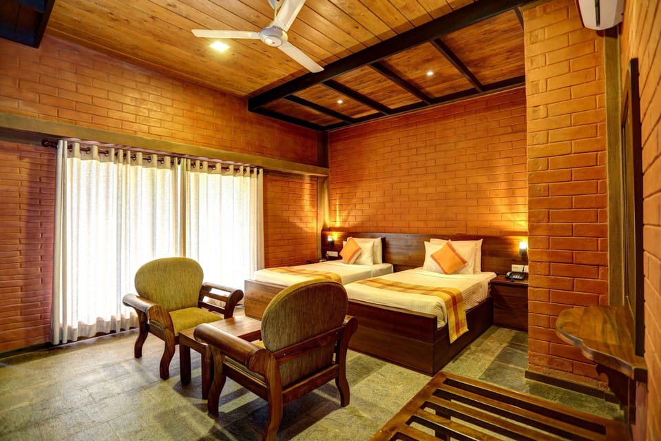 Twin Room, Garden View | In-room safe, desk, iron/ironing board (on request), WiFi (free)