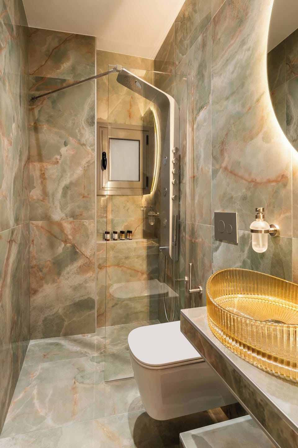 Marble tones brushed brass and a touch of spa indulgence