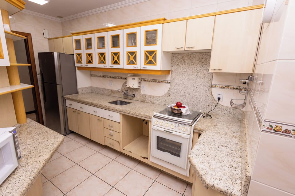 Family Apartment, 4 Bedrooms, Kitchen, City View | Private kitchen | Full-size fridge, microwave, oven, stovetop