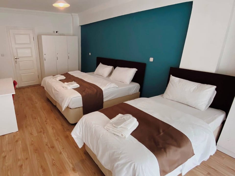 Standard Triple Room, Private Bathroom | Desk, laptop workspace, WiFi (free)