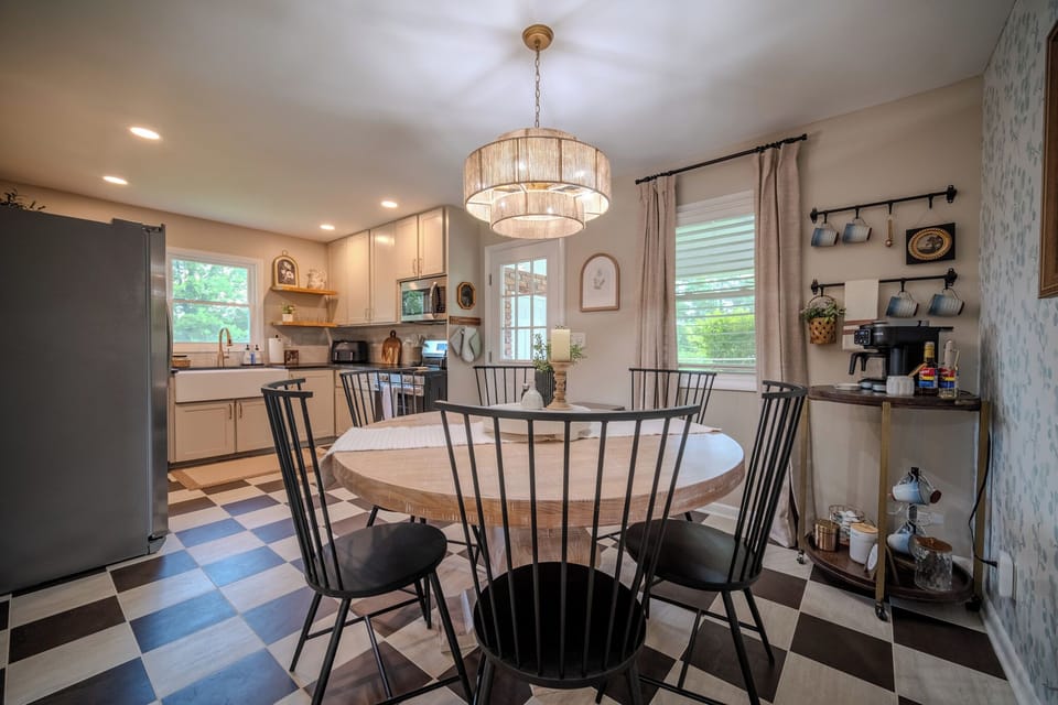 Charming dining area with seating for six, perfect for family meals and morning coffee.