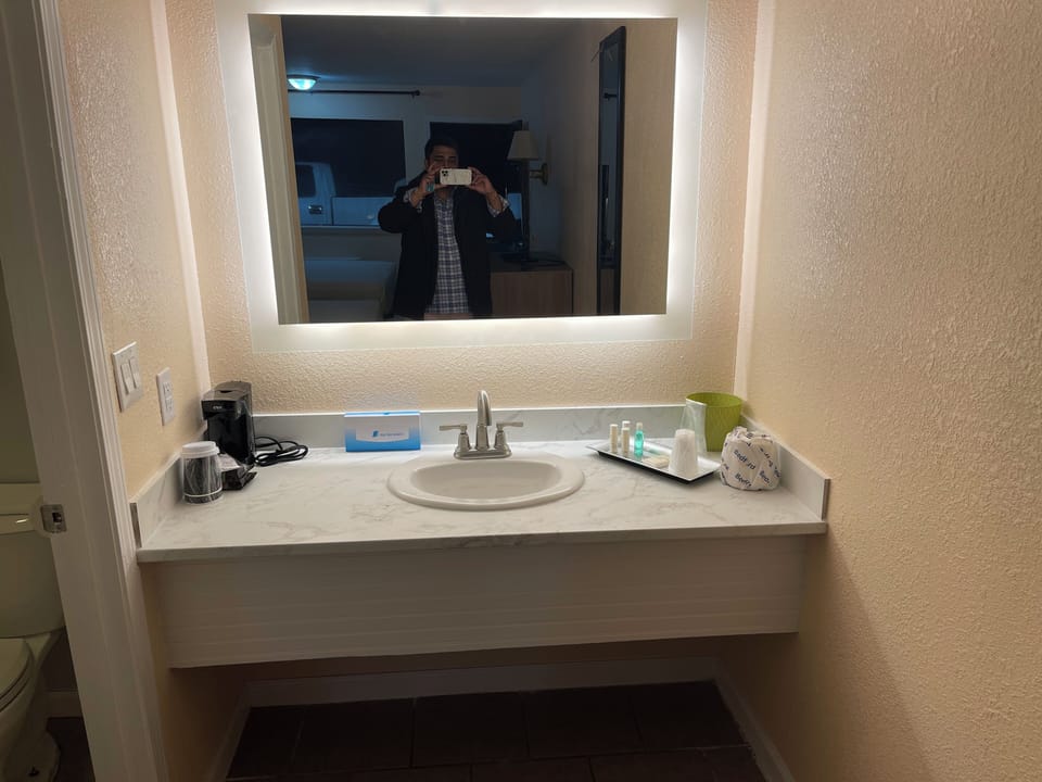 Combined shower/tub, towels, soap, shampoo