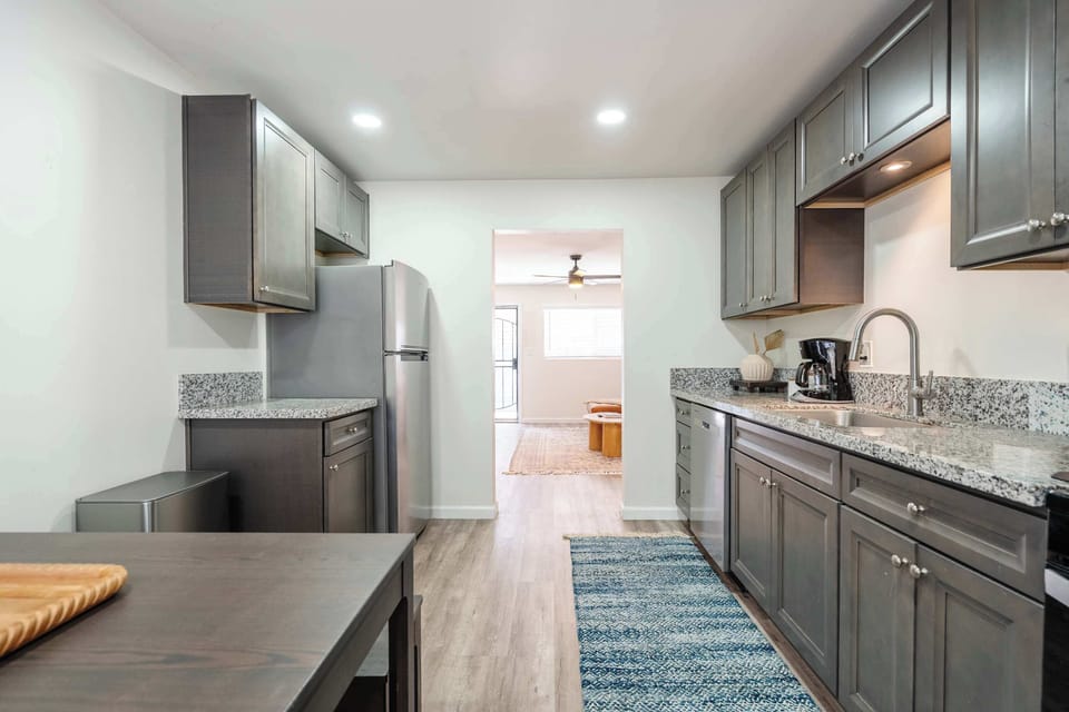 Spacious kitchen counters provide plenty of room for preparing snacks and meals.