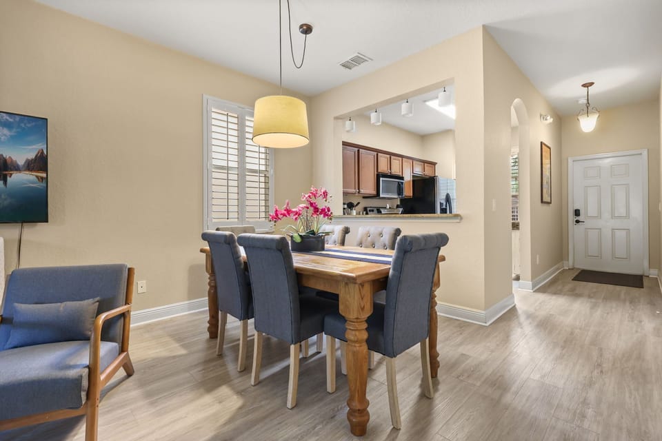 Share meals and memorable moments in this bright dining space, conveniently located beside the kitchen.