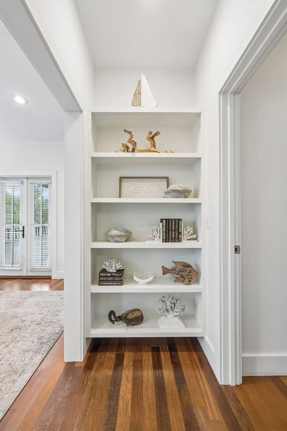 Little seaside treasures styled throughout the home.