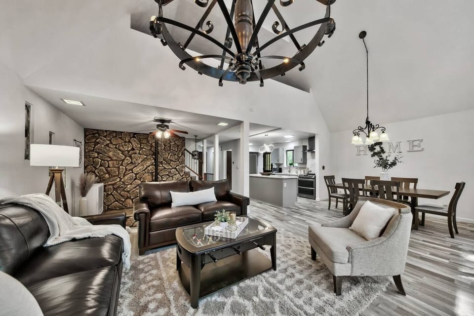 Relax in the cozy living room after a day exploring South Lake Tahoe. Comfortable seating, a warm mountain atmosphere, and an open layout make it the perfect place to unwind.