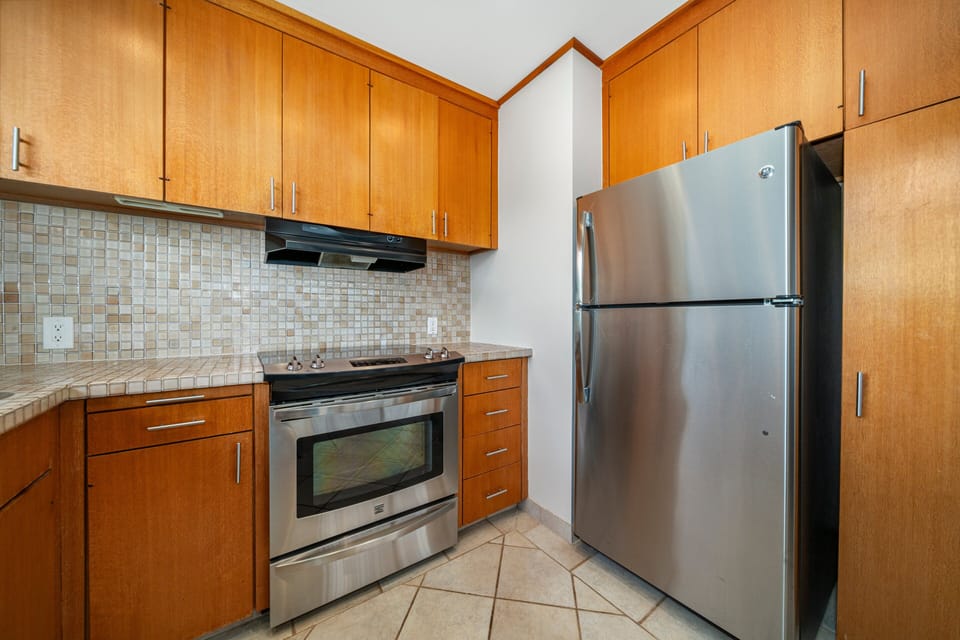 Modern kitchen featuring custom cabinetry and sleek finishes.