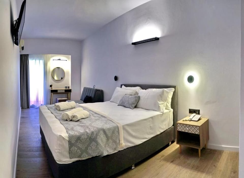 Double Room, Balcony, Pool View | In-room safe, blackout drapes, iron/ironing board (on request)
