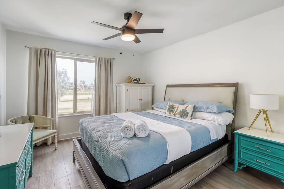 Rolling green fairways stretch toward the horizon, setting a peaceful backdrop for your stay.