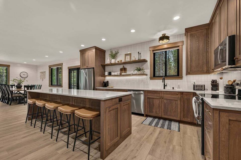 Fully equipped kitchen with a large island and plenty of counter space.