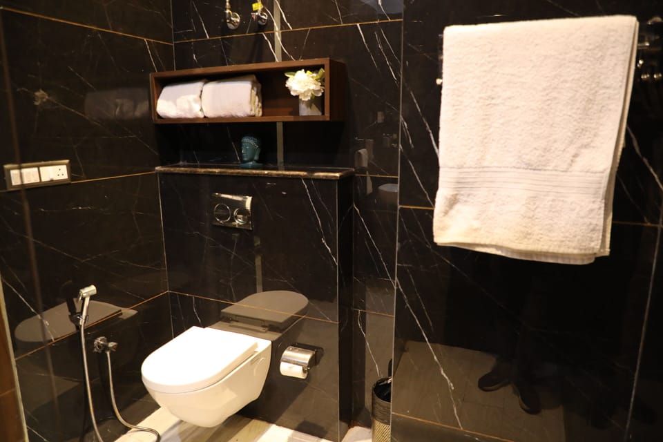 Shower, slippers, towels, soap