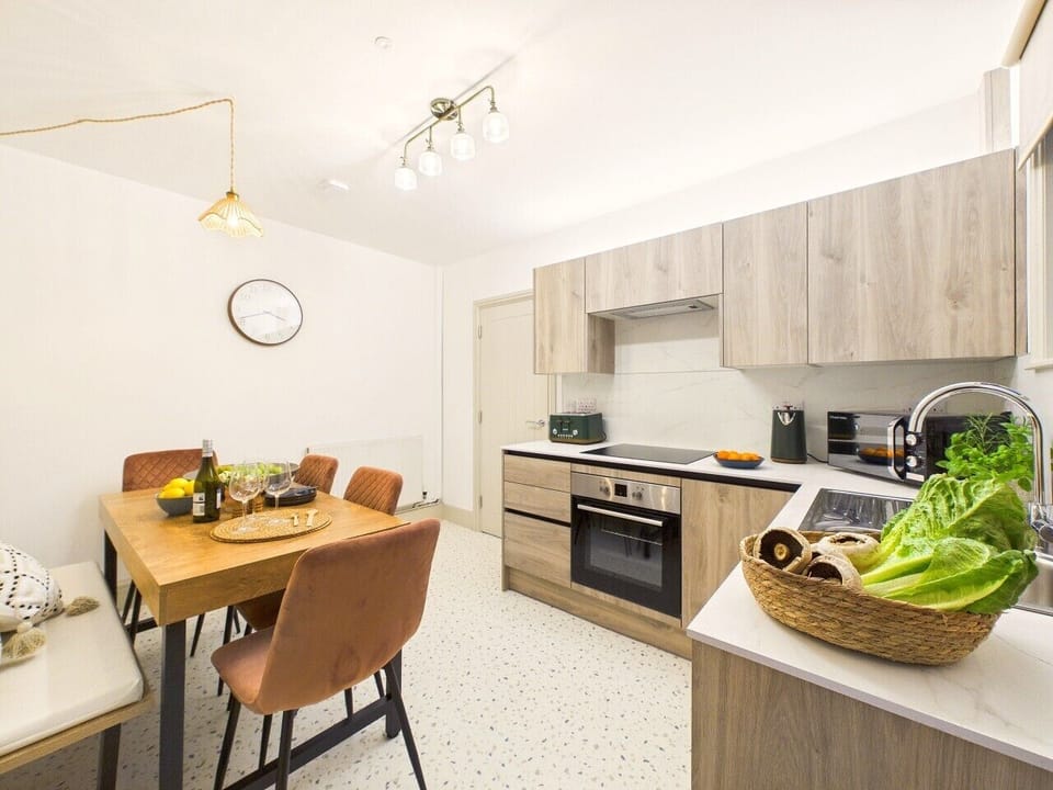 A fabulous open-plan kitchen-diner with modern appliances — the sociable hub of the house.