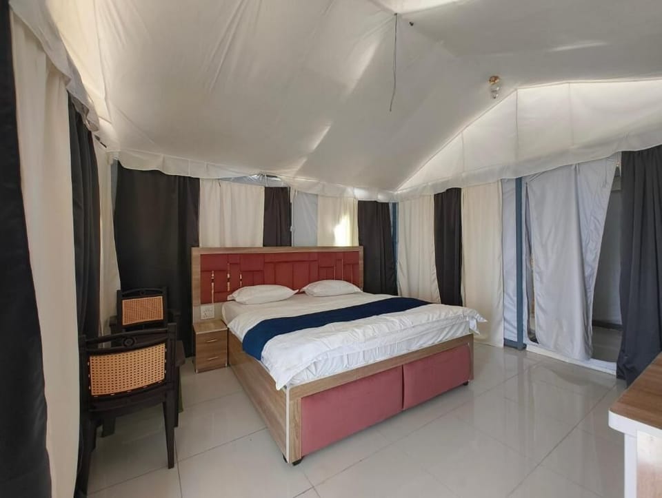 Deluxe Tent, Balcony, Garden View | Blackout drapes, WiFi (free)