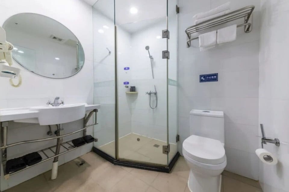 Standard Double Room | Bathroom | Shower, hair dryer, towels, soap