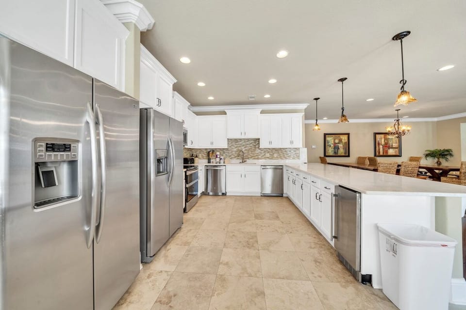 Two Stainless Steel Side By Side Fridges, Two Dishwashers and More!