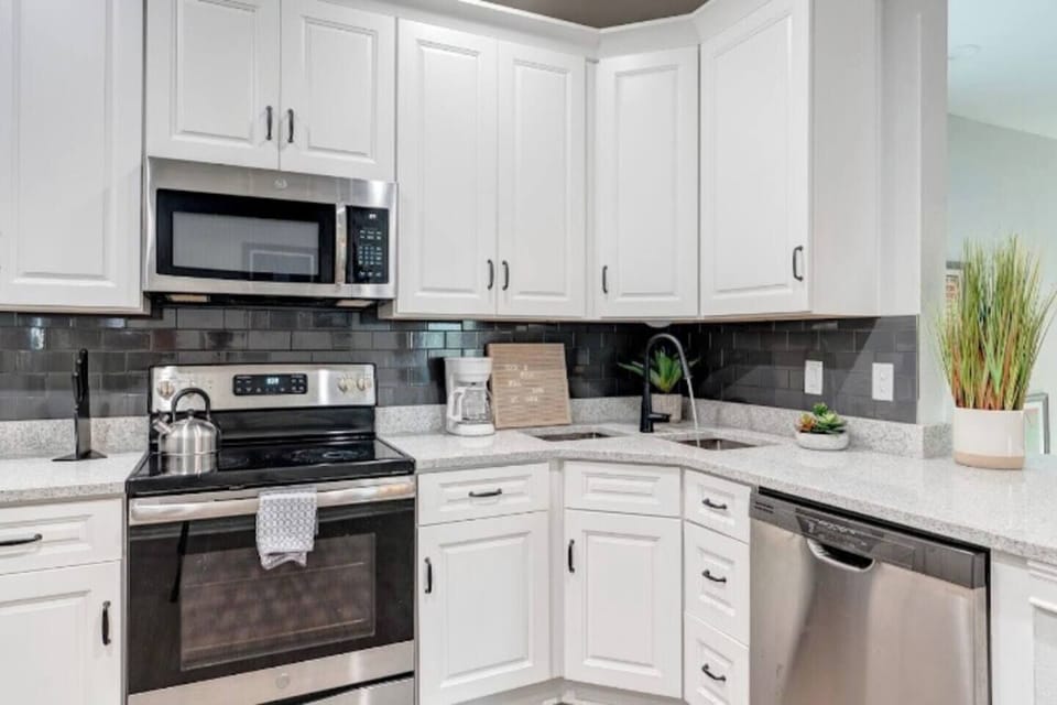 Enjoy cooking in your luxury kitchen, with a full suite of pots/pans, Columbian coffee and drip coffee maker, and filtered water from your GE french door refrigerator. Cutting boards, knives, oil and salt, as well as setting for 6 is in the cabinets.