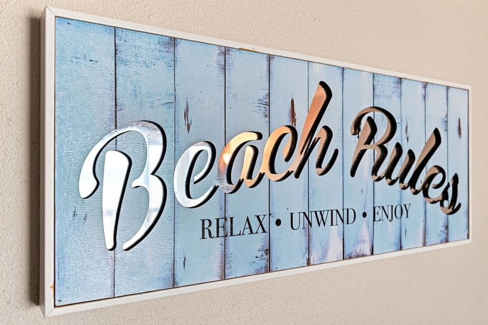 A playful beach-inspired accent sets the tone for relaxing, unwinding, and enjoying your time at High Tide