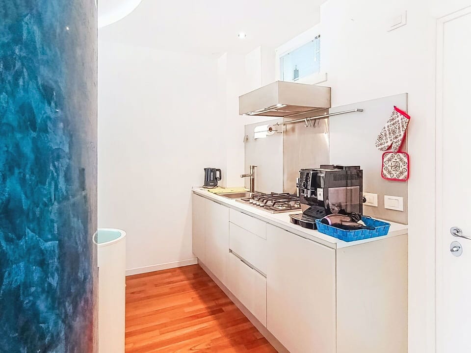 Interior Design, Flooring, Furniture, Wood, Floor, Room, Kitchen, Countertop, Kitchen Appliance, Major Appliance