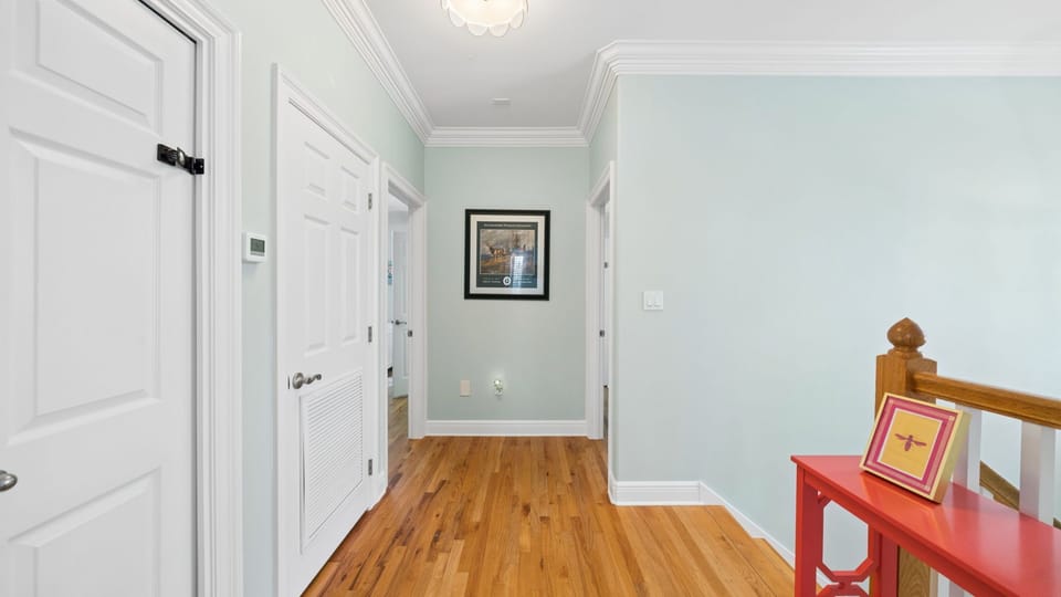 Second floor landing with three bedrooms