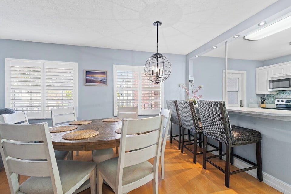 Gather around the dining table with seating for up to six guests.