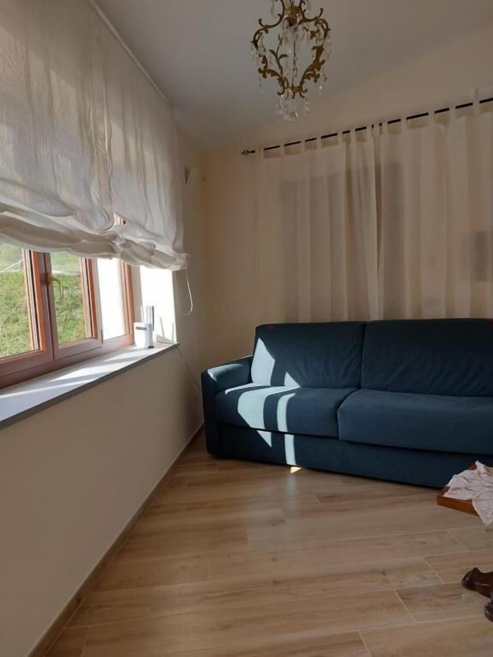 Quadruple Room, Park View | Living area