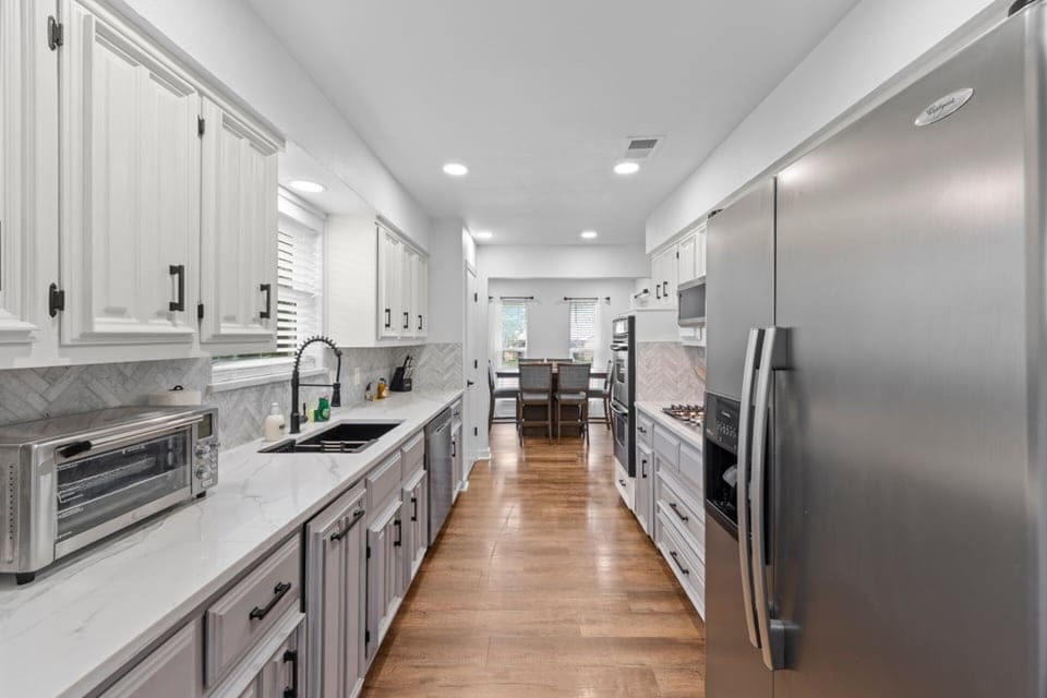 Enjoy effortless mornings and home-cooked meals in a beautifully renovated kitchen with room to spread out and settle in.