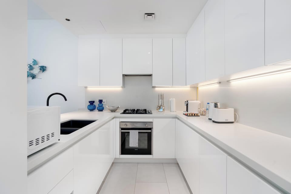 Deluxe Apartment, Patio, Canal View | Private kitchen | Espresso maker, coffee/tea maker, electric kettle