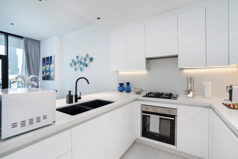 Deluxe Apartment, Patio, Canal View | Private kitchen | Espresso maker, coffee/tea maker, electric kettle