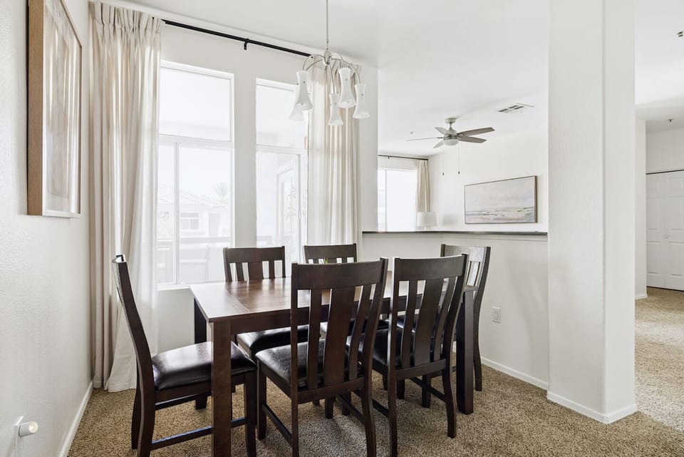 Bright open dining area with seating for 6 and beautiful natural light