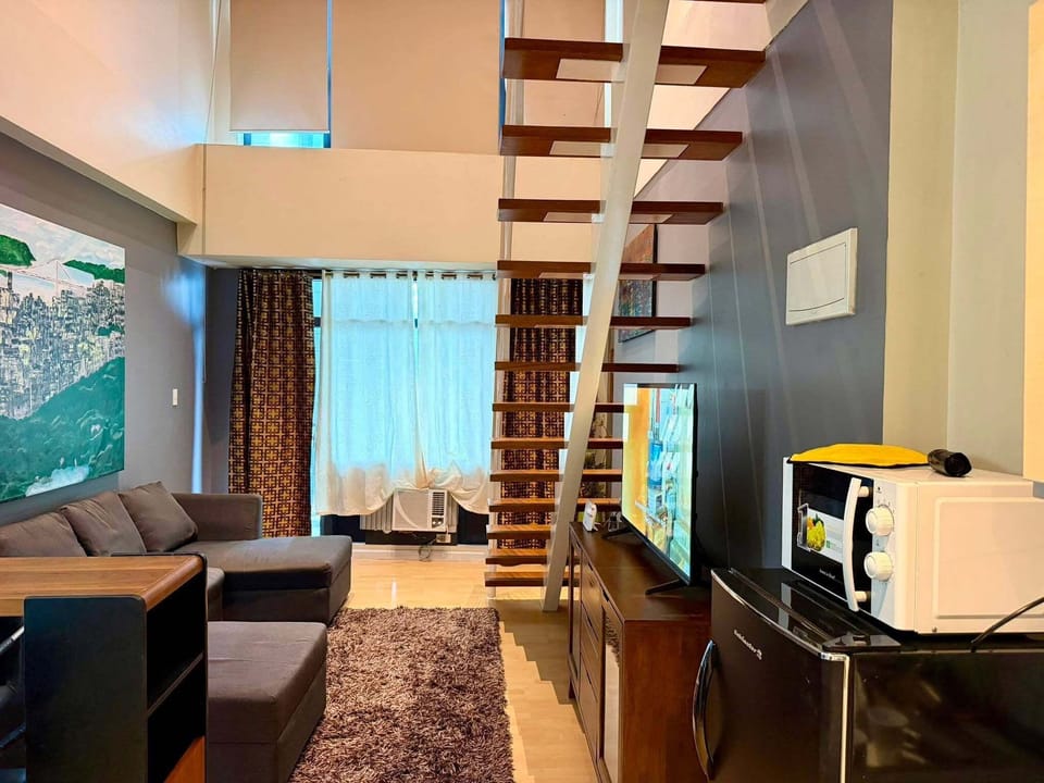 Family Loft, City View | Living area