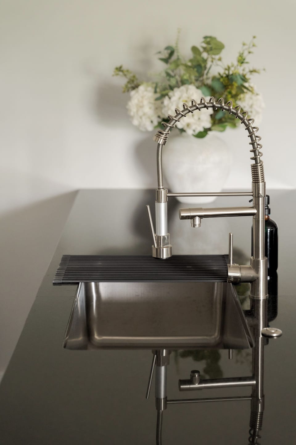 Stylish modern sink with sleek finishes and upscale kitchen design