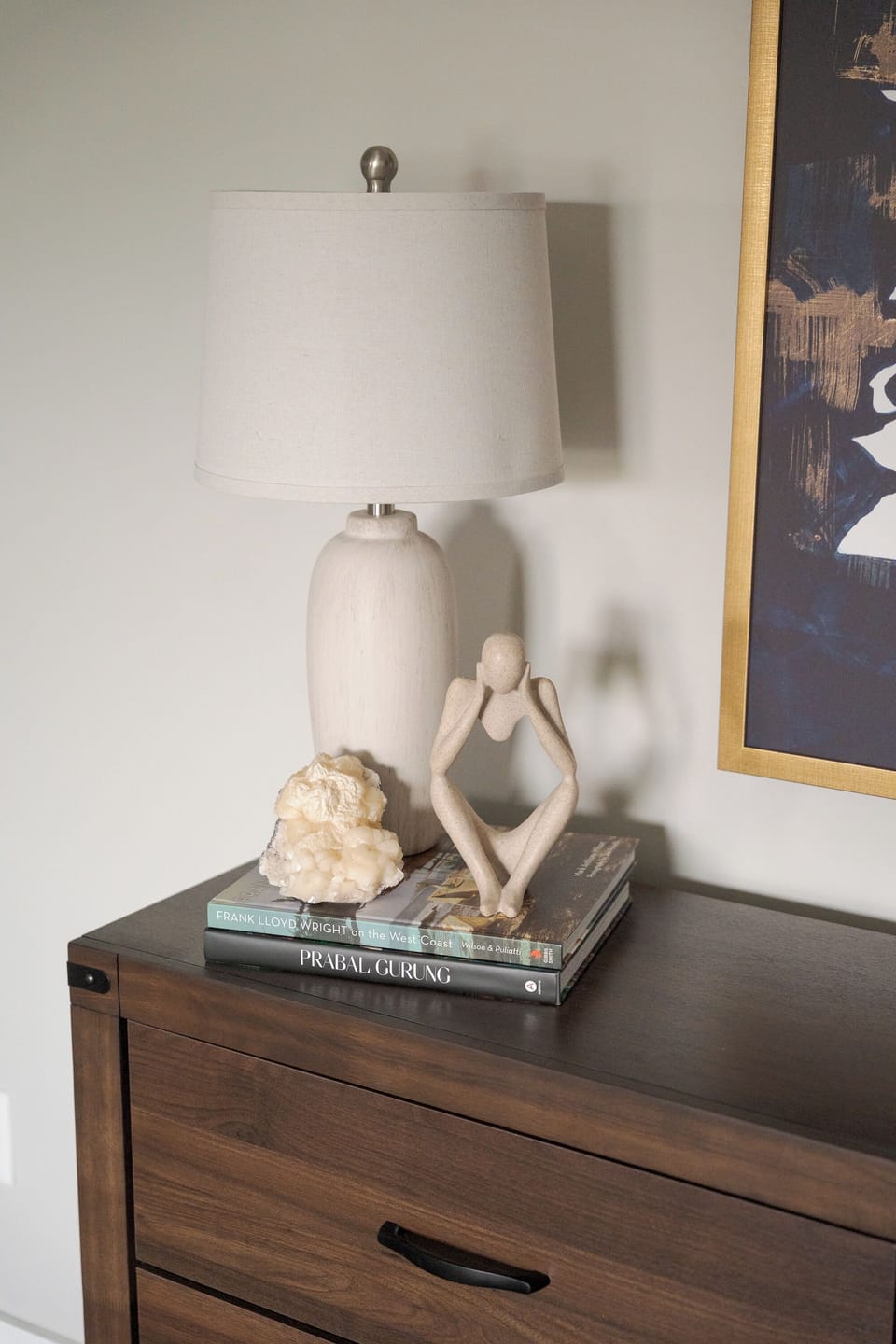 Styled entry console with elegant decor and warm modern accents