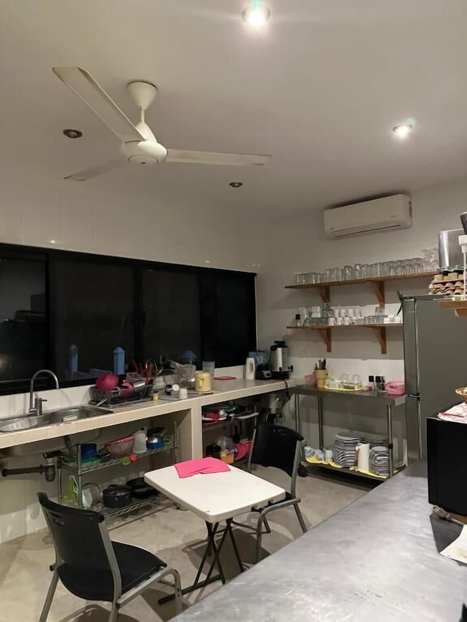 Mini-fridge, microwave, cookware/dishes/utensils