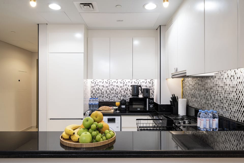 Luxury Apartment, Balcony, City View | Private kitchen | Coffee/tea maker, electric kettle, eco-friendly cleaning products