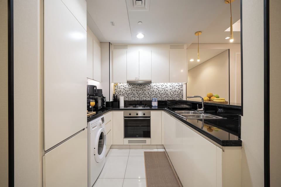 Luxury Apartment, Balcony, City View | Private kitchen | Coffee/tea maker, electric kettle, eco-friendly cleaning products