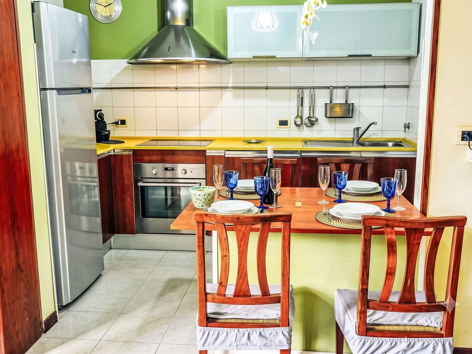Furniture, Kitchen, Kitchen Appliance, Major Appliance, Flooring, Interior Design, Wood, Countertop, Floor, Room
