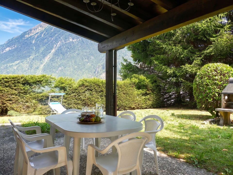 Furniture, Outdoor Furniture, Outdoor Table, Shade, Garden, Chair, Outdoor Structure, Lawn, Yard, Landscaping