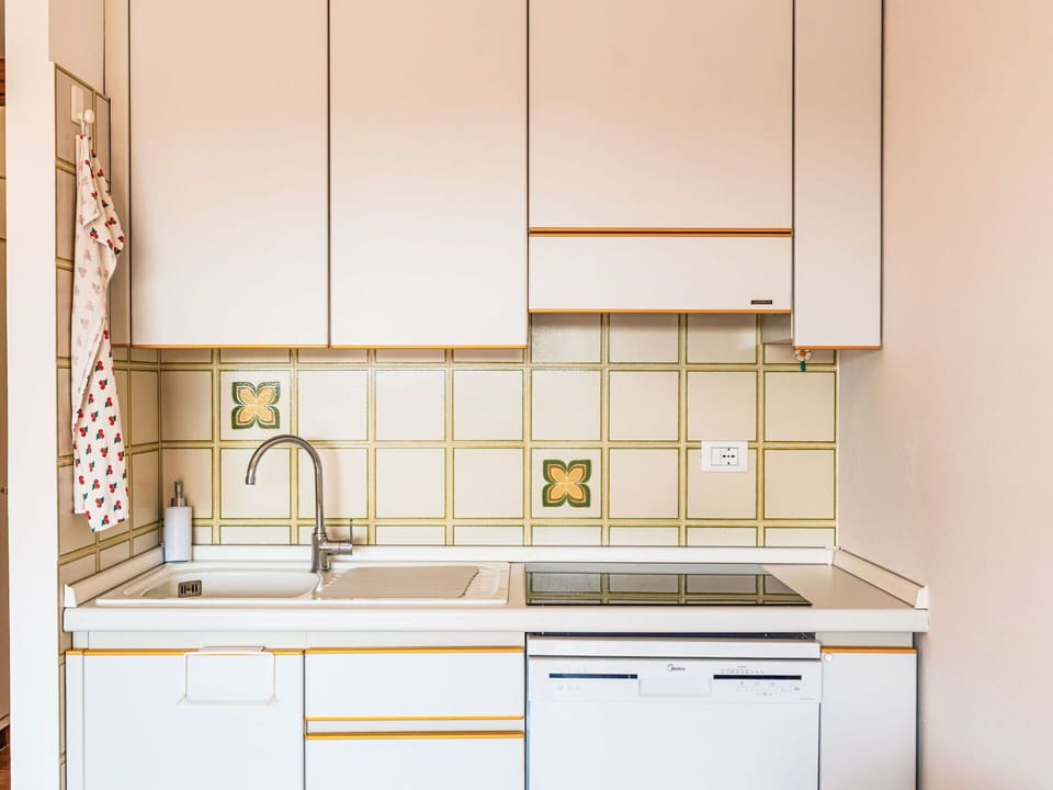 Kitchen, Interior Design, Wood, Flooring, Countertop, Kitchen Appliance, Cabinetry, Floor, Major Appliance, Room