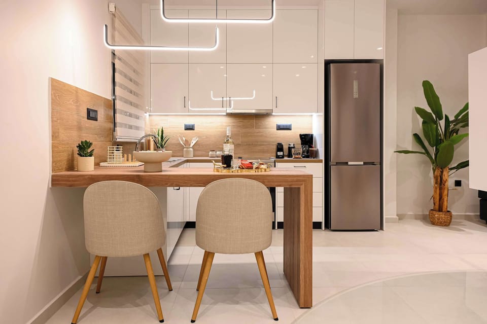 The dining area connects naturally with the kitchen and lounge, creating an open setting where everyone can spend time together.